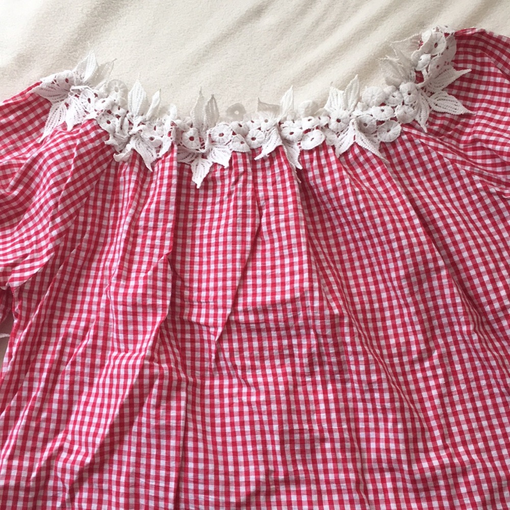 Red gingham top with white floral detailing